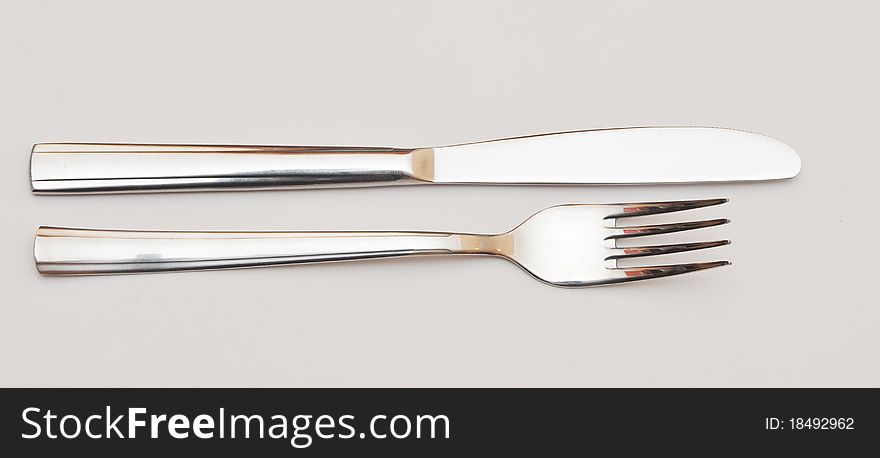 Close up of a knife and fork. Close up of a knife and fork