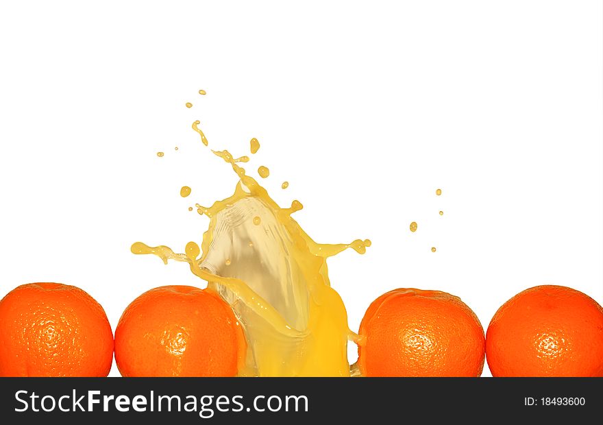 Splashing orange juice and fruits isolated on white background with clipping path. Splashing orange juice and fruits isolated on white background with clipping path