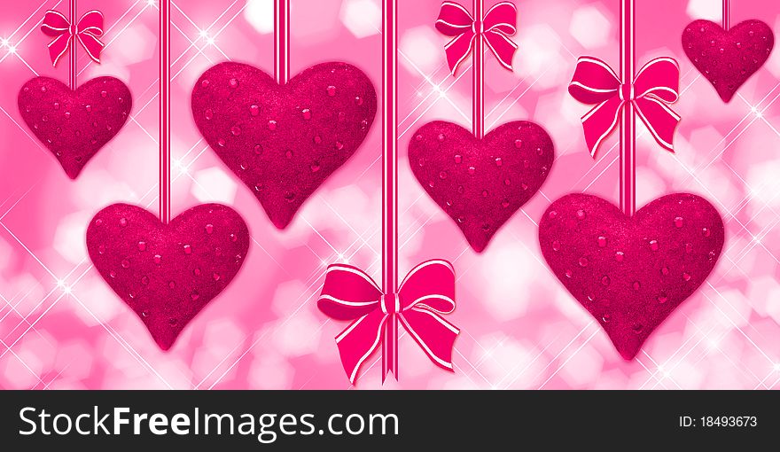 Pink hearts hanging with bows