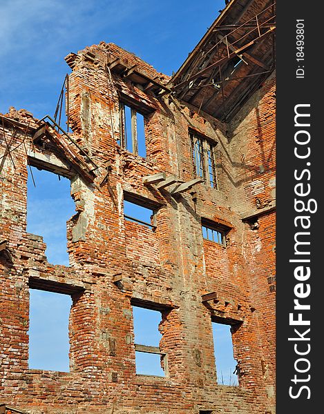 Ruins of an old industrial building against the sky