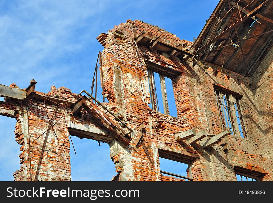 Ruins of an old industrial building against the sky