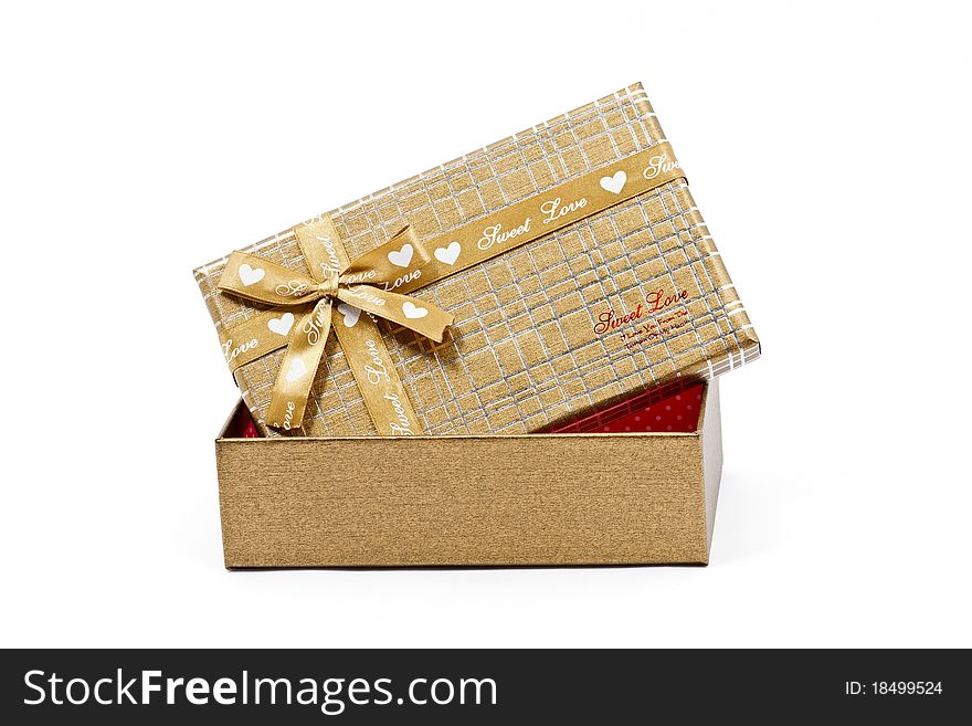 Gold striped present box isolated on white background