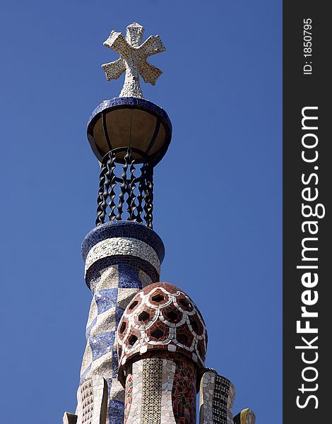 Detail of a tower at the Parc Guell at the city of Barcelona, Catalunya, Spain, Europe. Detail of a tower at the Parc Guell at the city of Barcelona, Catalunya, Spain, Europe