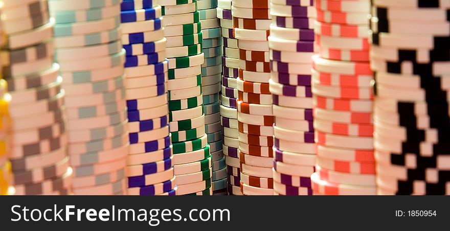 Tall stacks of chips that are completely surrounding the viewer. Tall stacks of chips that are completely surrounding the viewer.