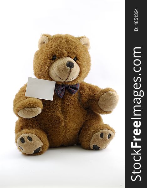 Teddy bear with a blak note isolated in a white background. Teddy bear with a blak note isolated in a white background