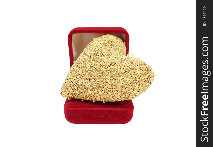 Golden heart on a red gift box