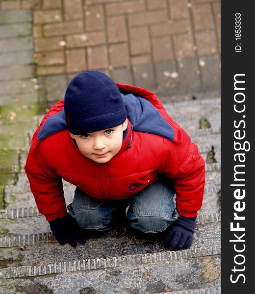 Boy playing on the stairs. Boy playing on the stairs