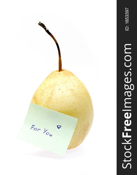 Single fresh pear with message isolated on white background