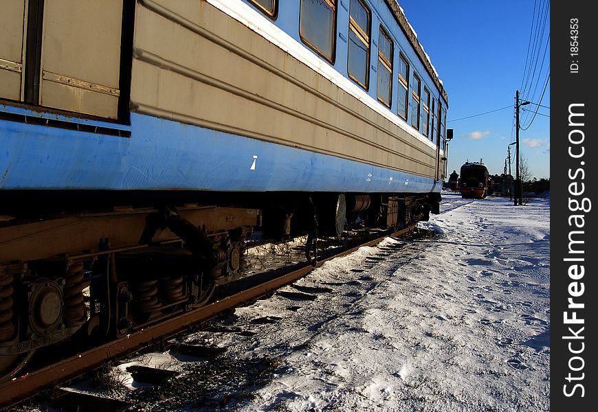 Unsused passenger waggon and train in winter scene. Unsused passenger waggon and train in winter scene