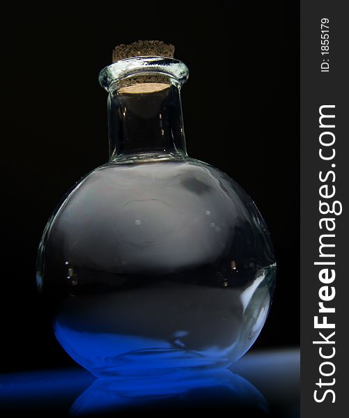 This is a glass flask used in science or to hold flowers.