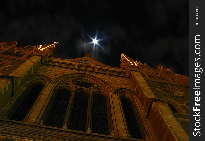 St Paul's Cathedral, Melbourne Australia, located on Swanston Street and Flinders Street, in the CBD. This photo is at night with the moon shining through clouds. This is a historic building in Melbourne, and was built in 1882. St Paul's Cathedral, Melbourne Australia, located on Swanston Street and Flinders Street, in the CBD. This photo is at night with the moon shining through clouds. This is a historic building in Melbourne, and was built in 1882.