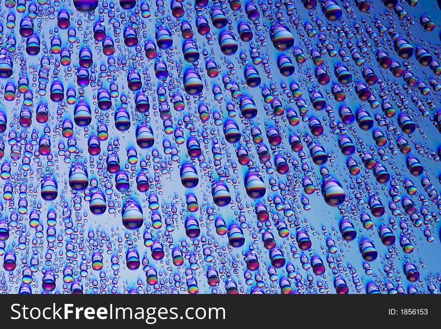 Macro photo of water drops on a spectral surface. Macro photo of water drops on a spectral surface