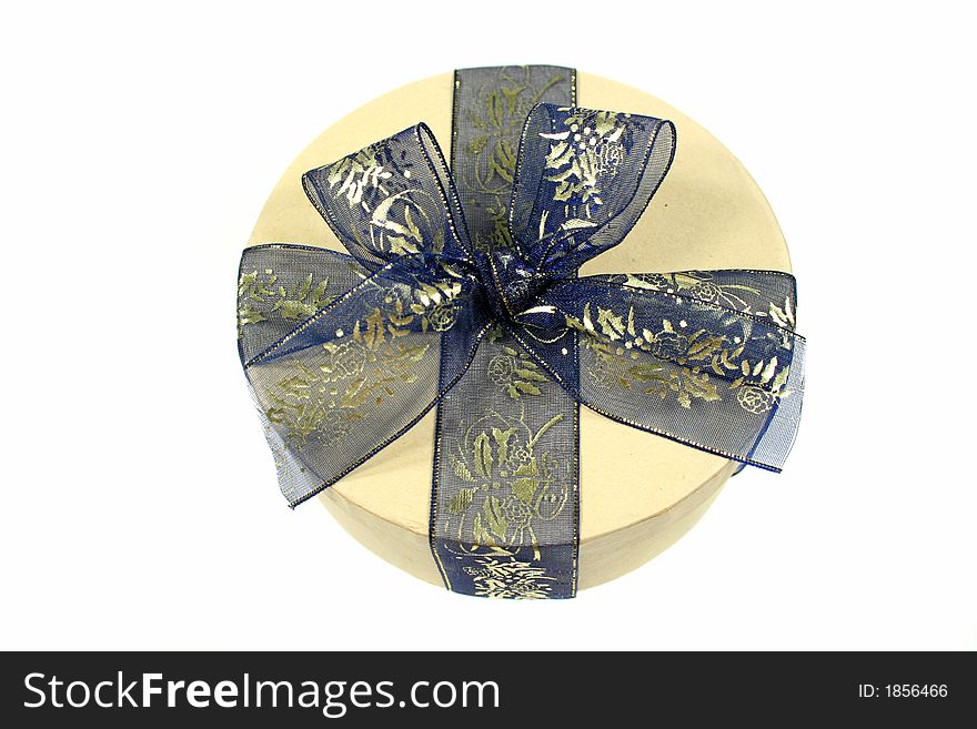 Blue and gold gift wrapped present. Blue and gold gift wrapped present.