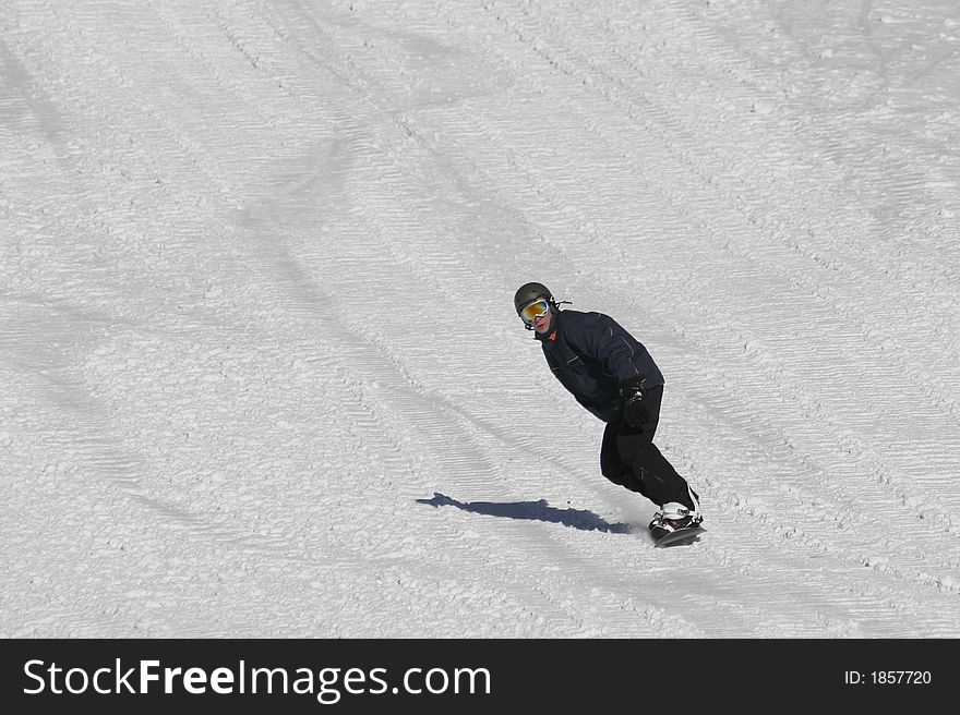 Photo of riding snowboarder on 200mm zoom