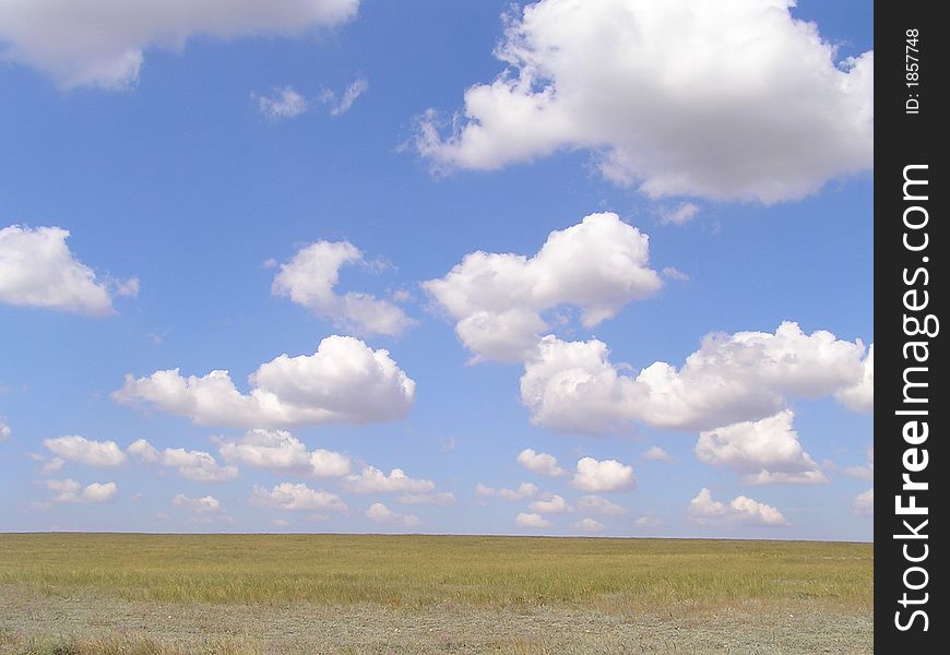 Cloudy landscape in sunny day with blue sky