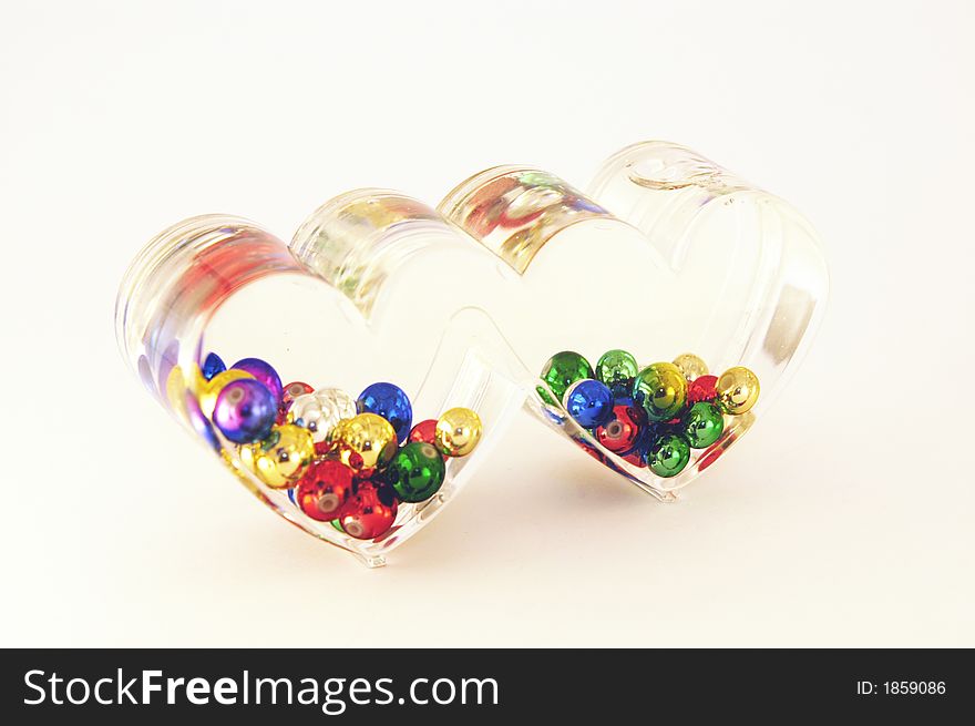 Two clear valentine hearts with bubbles in it. Two clear valentine hearts with bubbles in it