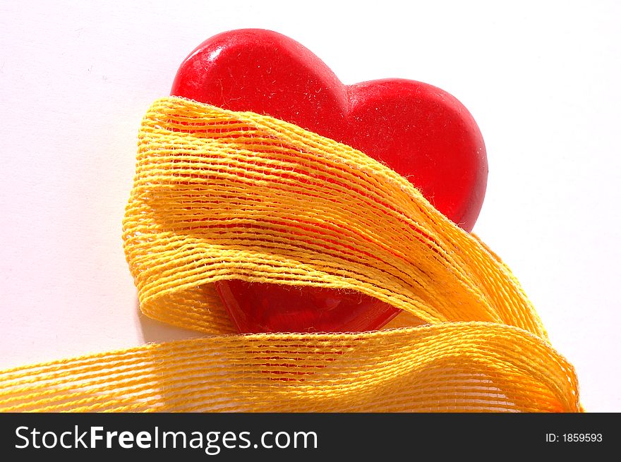 Red heart with yellow ribbon. Red heart with yellow ribbon