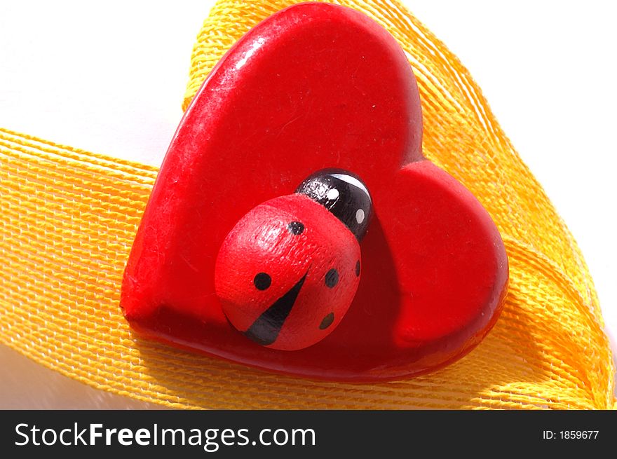 Red heart with yellow ribbon and ladybug. Red heart with yellow ribbon and ladybug