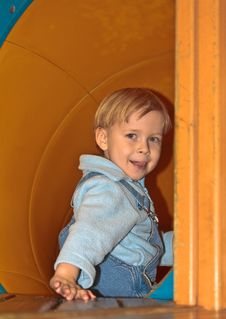 Boy In Tube Slide Royalty Free Stock Image Boy In Tube Slide Royalty Free Stock Image