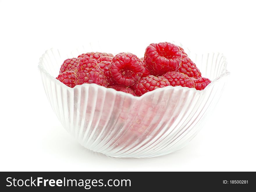 Fresh raspberry fruits isolated on white background