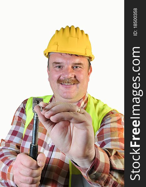 Worker driving a nail isolated on white background. Worker driving a nail isolated on white background