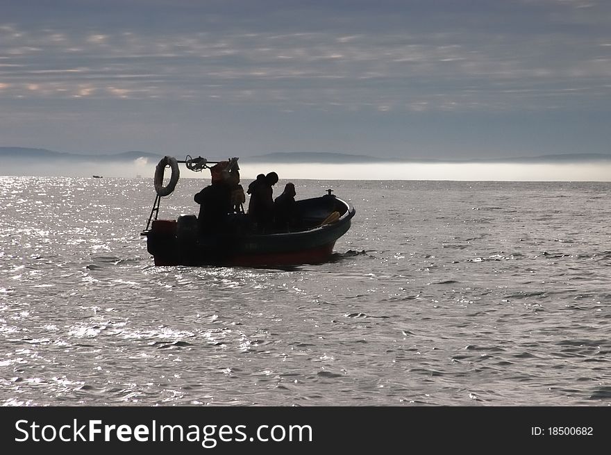 Fishermen on their boats out to sea. Fishermen on their boats out to sea