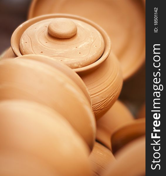 Close-up of handmade earthenware at an exhibition. Close-up of handmade earthenware at an exhibition