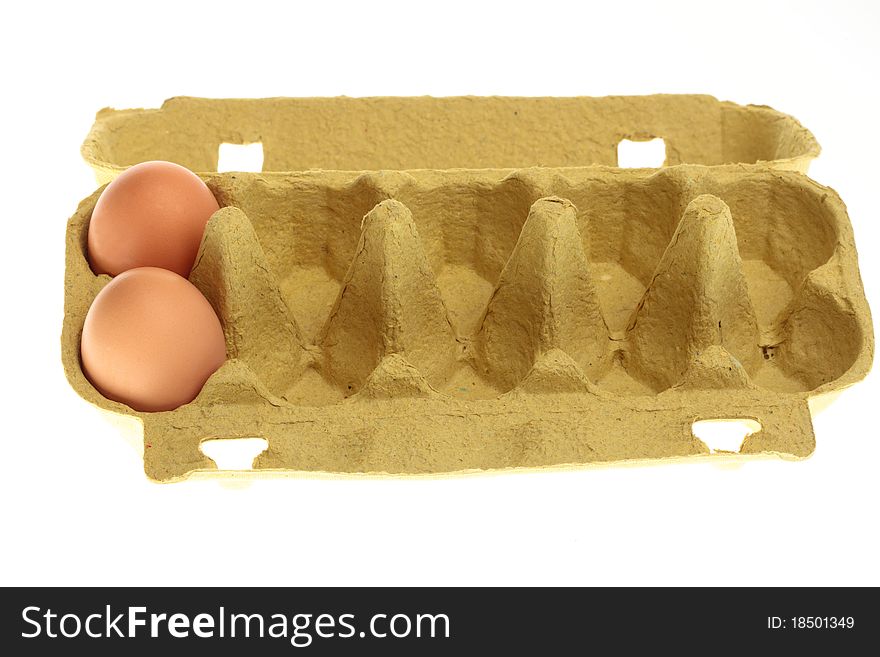 Eggs in box isolated on a white background