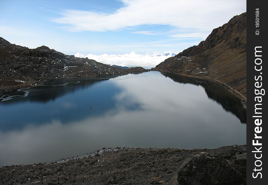 Lake on top of a mountain with clear sky above. Nepal. Lake on top of a mountain with clear sky above. Nepal