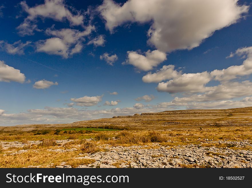 Dry grass, stones and rocks on sunny day in Burren National Park, Co Limerick, Ireland. Dry grass, stones and rocks on sunny day in Burren National Park, Co Limerick, Ireland