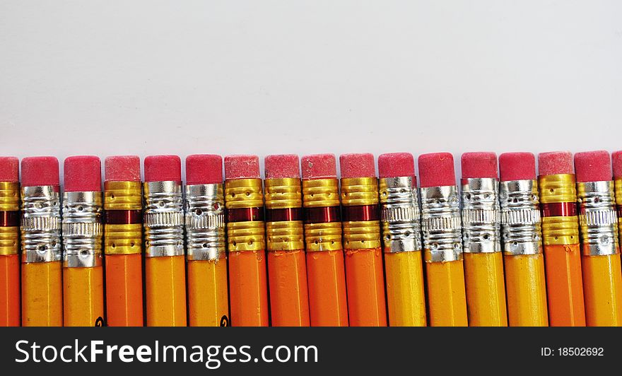 Closeup of pencils and erasers. Closeup of pencils and erasers