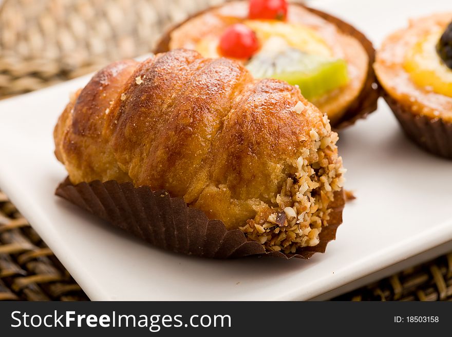 Photo of different delicious pastries on the table