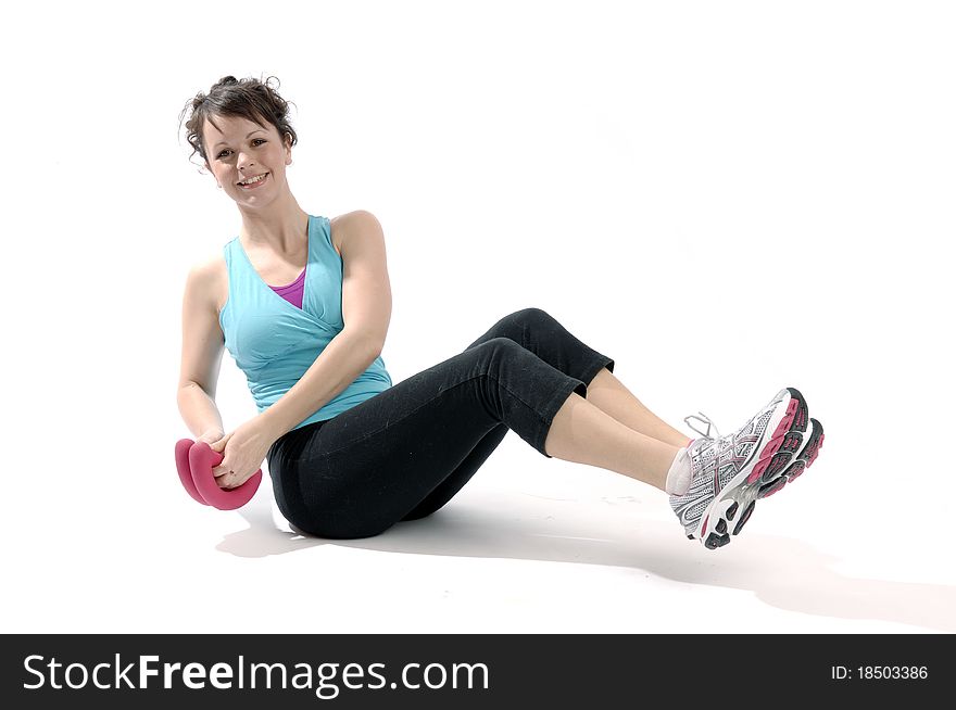 Young pretty woman exercises isolated on white background. Young pretty woman exercises isolated on white background.