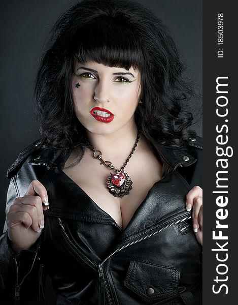 Hot rocker babe headshot wearing leather jacket