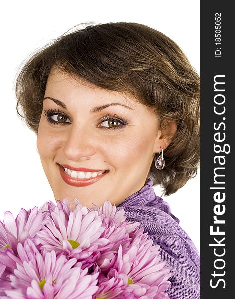 Attractive young woman face in purple scarf with pink flowers isolated on the white. Attractive young woman face in purple scarf with pink flowers isolated on the white.