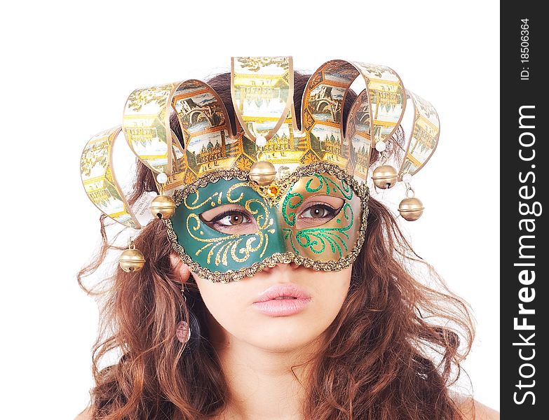 The serious girl in a mask on white background
