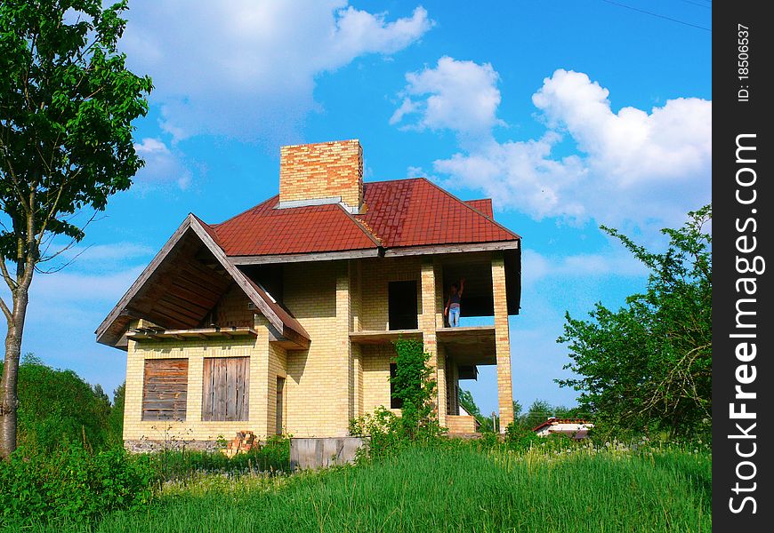 Unfinished abandoned house. Rural landscape in Lithuania