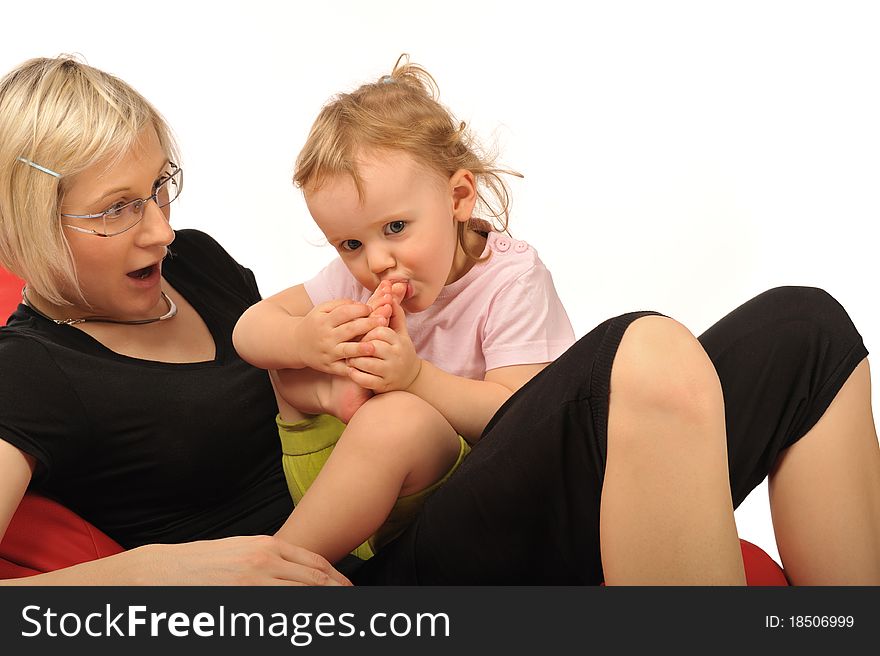 Mother With Little Baby In Studio