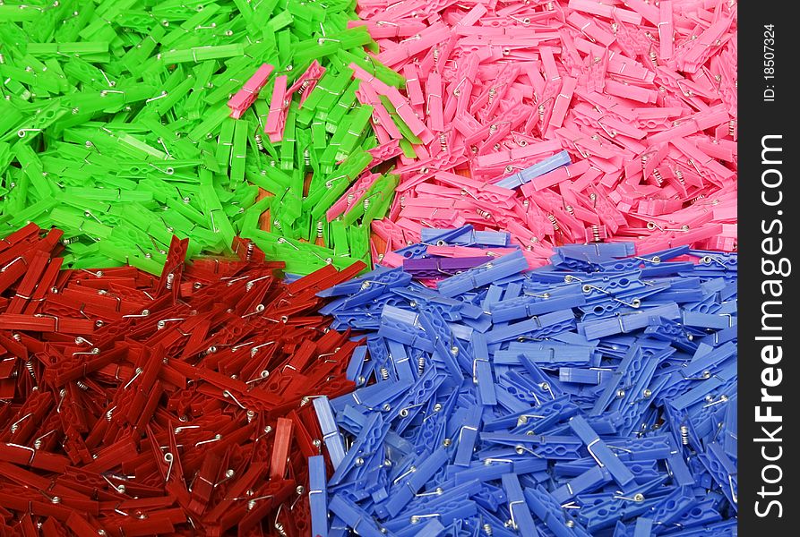 Colored washing line pegs on a market stall table