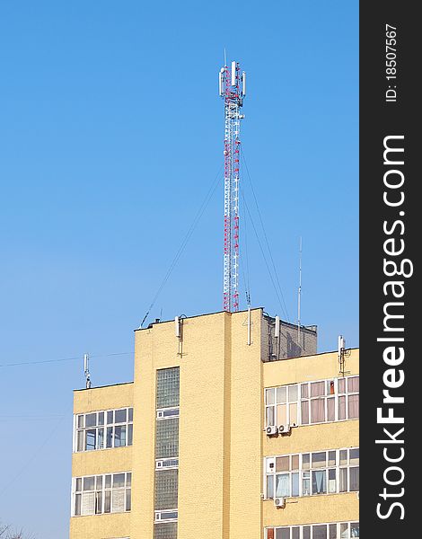 Detail of transmitter tower against clear blue sky