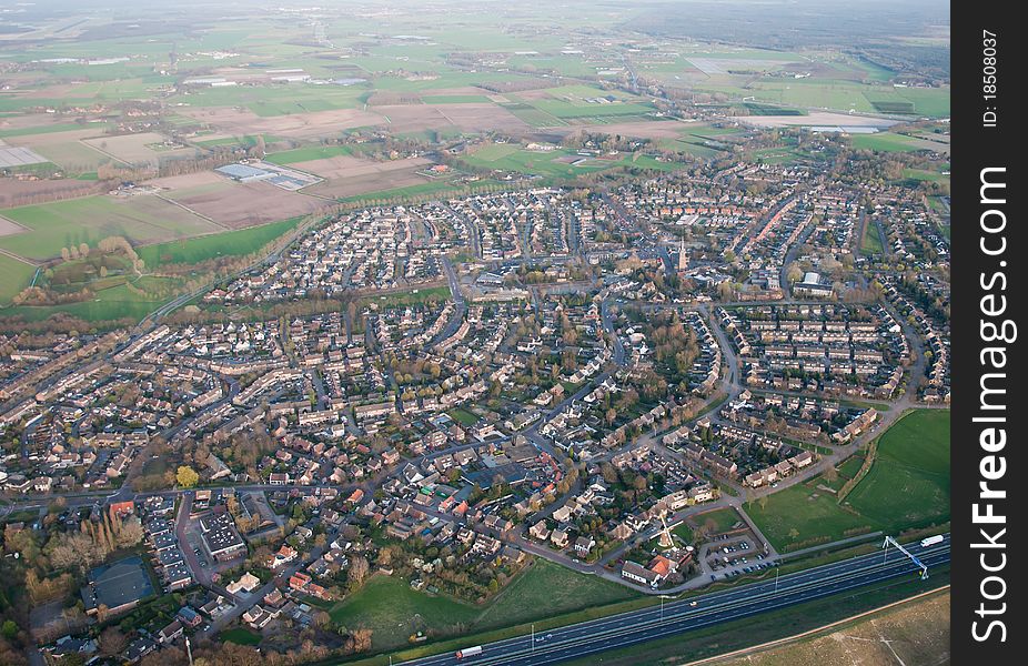 Aerial view of the village of Bavel (Netherlands). Below right you see the windmill of Bavel.