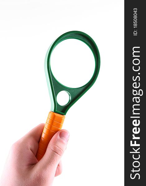 Magnifier in hand on a white background.