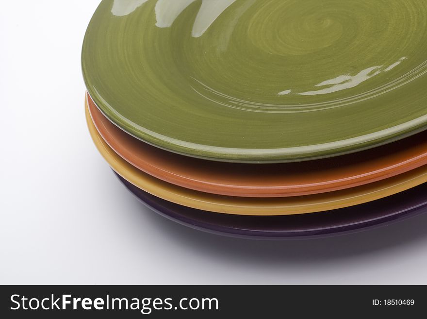 Colorful ceramic plates for the main dishes.