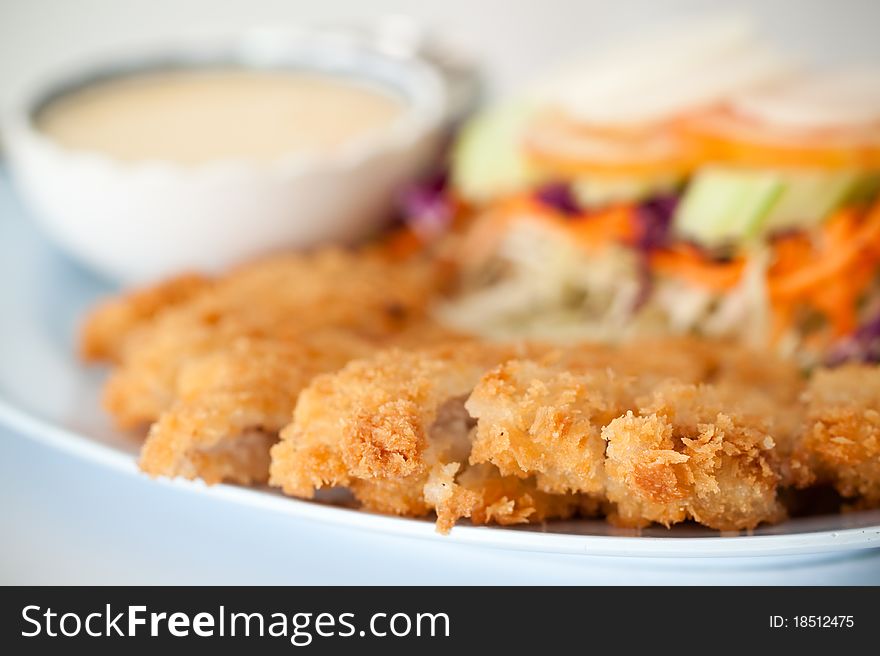 Batter-fried pork salad show as shallow depth of field photograph technical