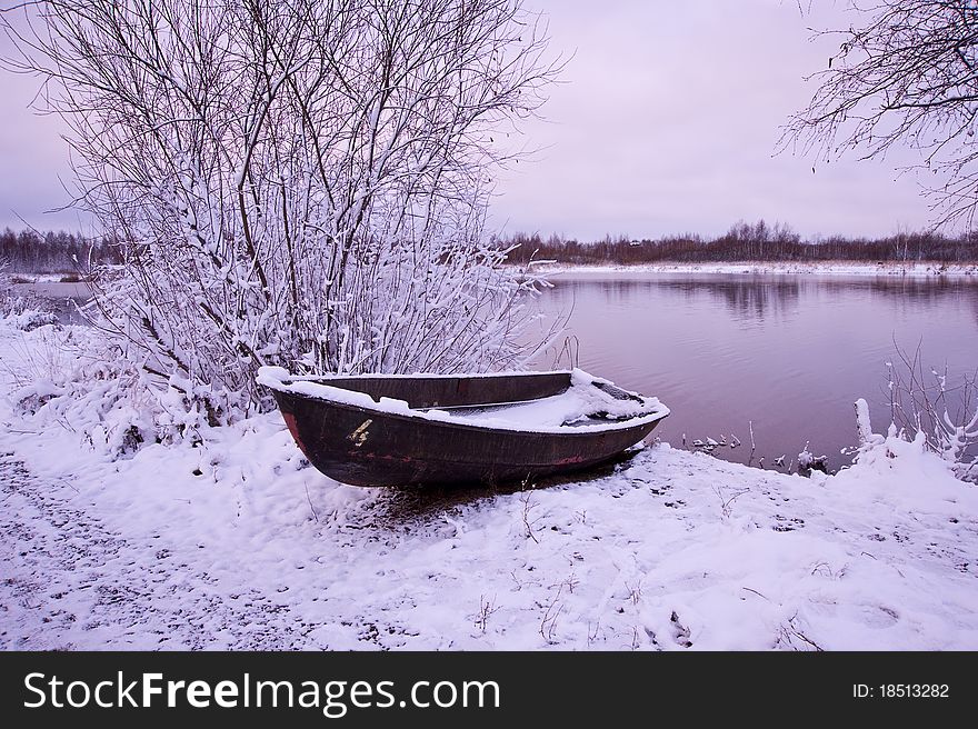 Winter boat.Soon dawn