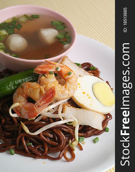 Malaysian chinese dry noodle with egg and shrimp. Malaysian chinese dry noodle with egg and shrimp