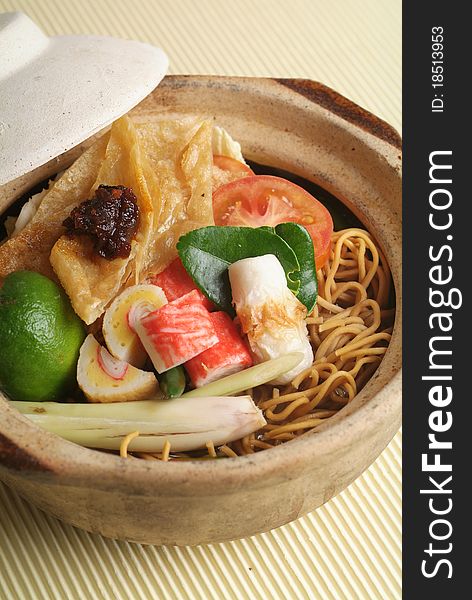 Claypot seafood soup with crispy noodle. Claypot seafood soup with crispy noodle