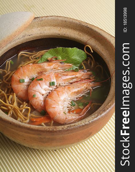 Claypot seafood soup with crispy noodle. Claypot seafood soup with crispy noodle