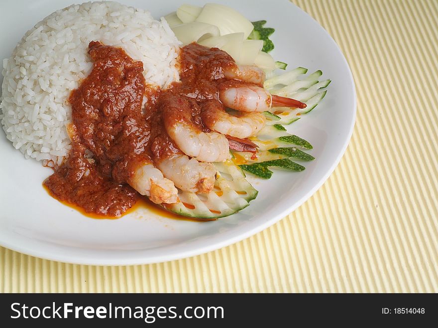 Prawn curry served with basmati rice