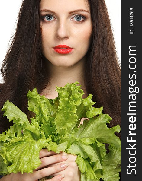 Young female holding green lettuce isolated on white. Young female holding green lettuce isolated on white